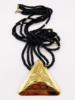 VINTAGE Long black wooden bead and etched aged brass triangle pendant necklace